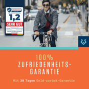 Ein lächelnder Mann in einem grauen Mantel und mit Sonnenbrille fährt mit einem Fahrrad im Freien. Das Bild zeigt das Alphatrail Schläuche Rick - 28" Tour AV von Alphatrail, mit "100% Zufriedenheitsgarantie", "Sehr Gut" Warentest, und 30 Tage Geld-zurück-Garantie.