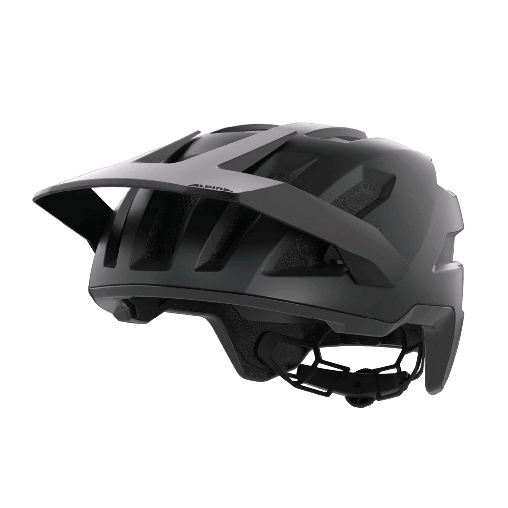 Der Alpina - Taunus Mips MTB-Helm von Alpina in mattem Schwarz verfügt über ein Visier, große Belüftungsöffnungen, einen verstellbaren Hinterriemen und eine robuste Ceramic Shell. Abgebildet vor einem einfarbig grauen Hintergrund.