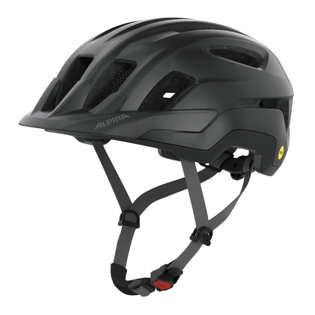 Der Alpina - Paranus Mips Helm von Alpina ist mattschwarz mit mehreren Belüftungsöffnungen, verstellbaren grauen Kinnriemen und einer roten Schnalle, die vor einem schlichten grauen Hintergrund steht.