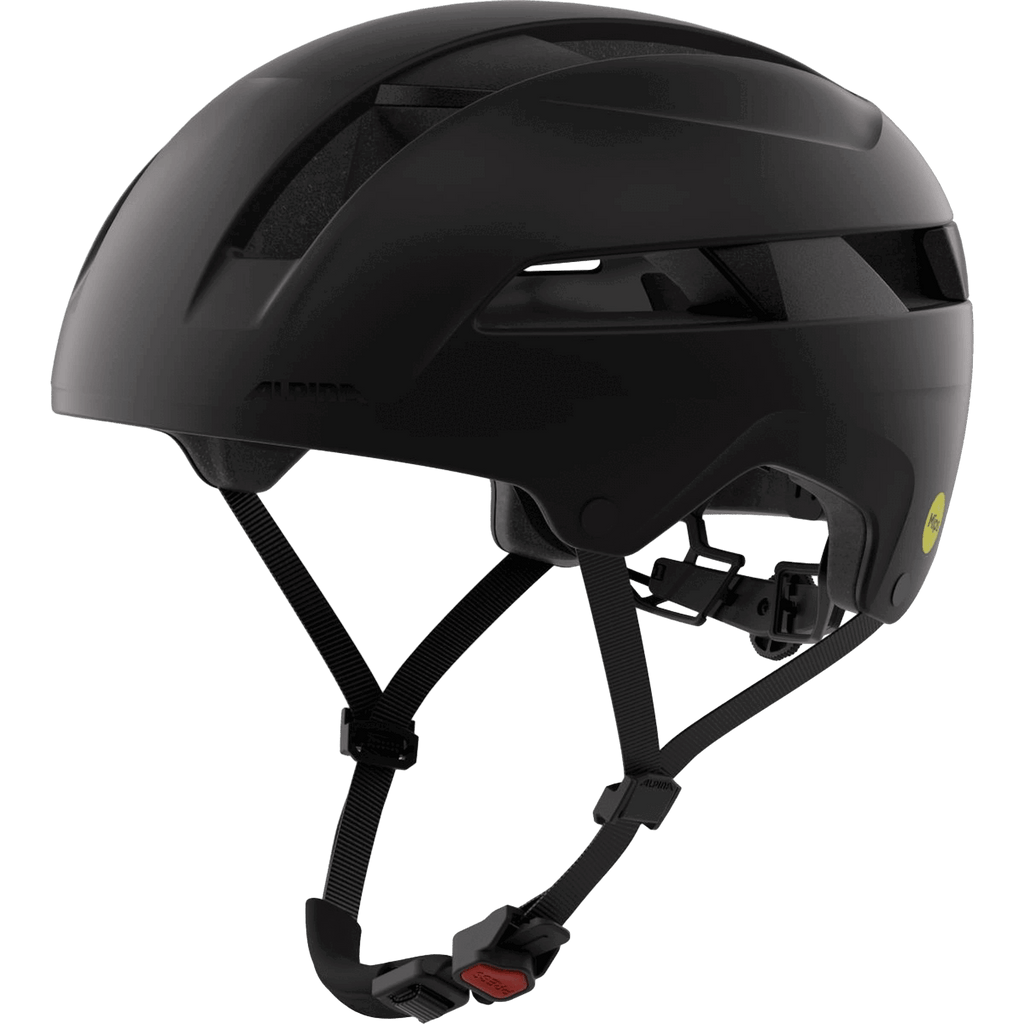 Der Alpina - Bloom Mips Helm von Alpina, in mattem Schwarz mit Hartschalenkonstruktion, Belüftungsschlitzen, verstellbaren Kinnriemen und einer sicheren Schnalle, wird von der Seite auf einem transparenten Hintergrund gezeigt.