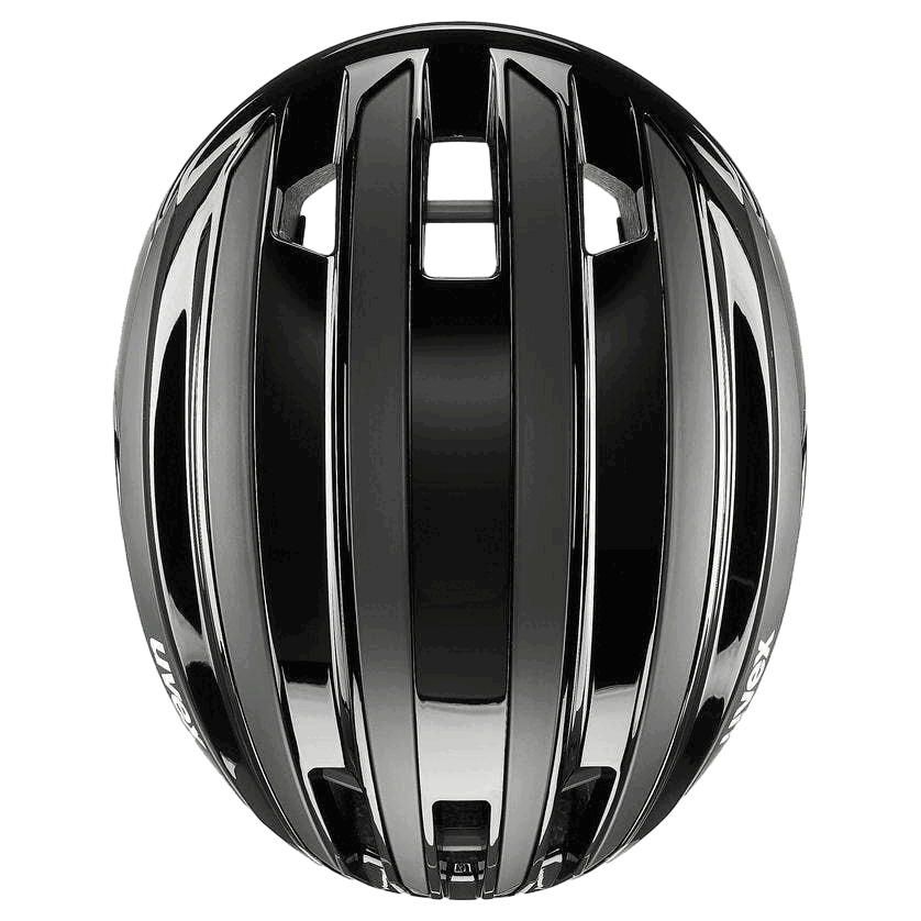 Draufsicht auf den Uvex - Surge Aero Mips Helm von Uvex mit glänzend schwarzem Finish, mehreren verlängerten Belüftungsschlitzen und einem schlanken, aerodynamischen Design.