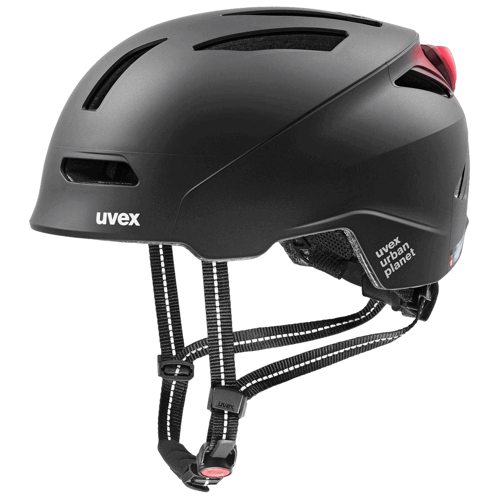 Der Uvex - Urban Planet LED ist ein schwarzer Helm mit Lüftungsschlitzen, verstellbaren Riemen und einem roten Rücklicht. Er wurde für Sicherheit und Komfort entwickelt, ist ideal für umweltfreundliches Pendeln und trägt das stilvolle Uvex-Logo.