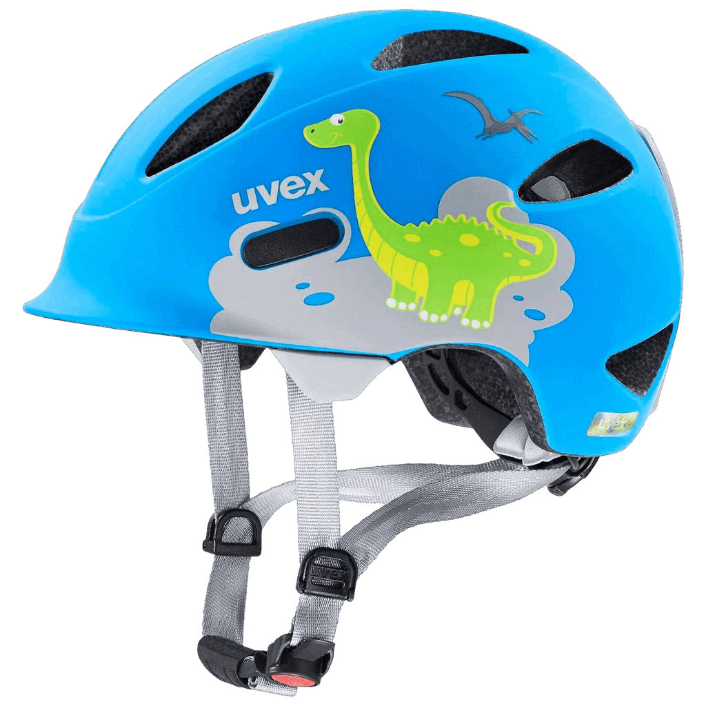 Der Uvex - Oyo von Uvex ist ein blauer Kinderhelm für Babys und Kleinkinder, verziert mit einem grünen Dinosaurier und einem fliegenden Pterodaktylus, sowie grauen, verstellbaren Riemen und Belüftungslöchern.